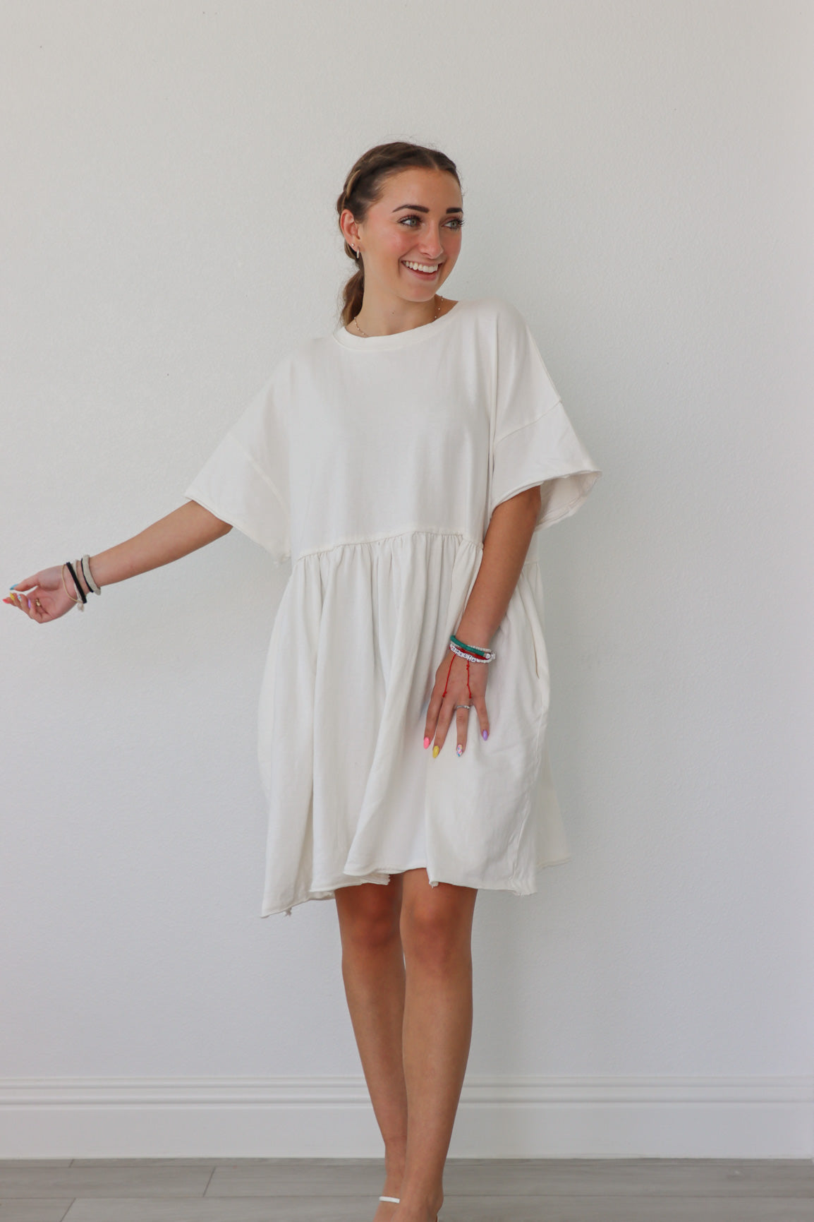girl wearing white oversized t-shirt dress