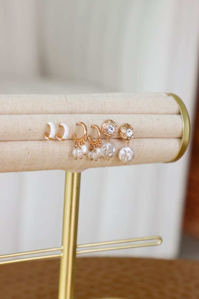 set of gold and white earrings: sold as a set of 3