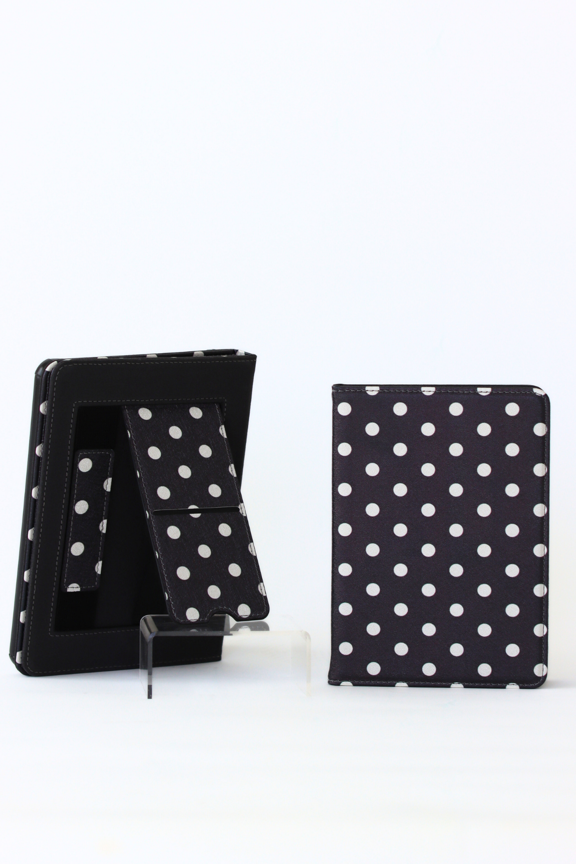 Black and white polka dot case for a tablet on a white background