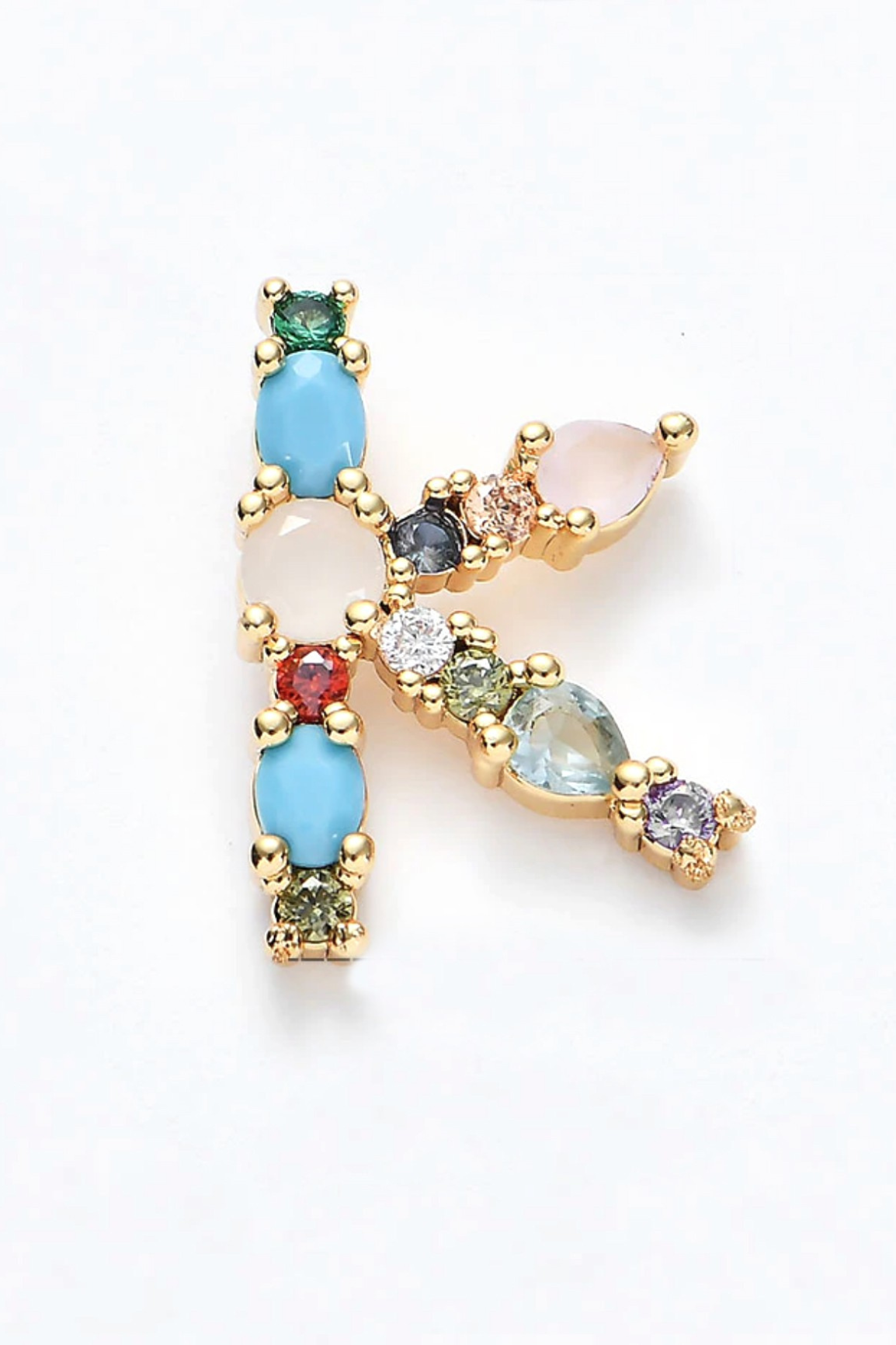 Jewelry with multicolored gemstones on a white background