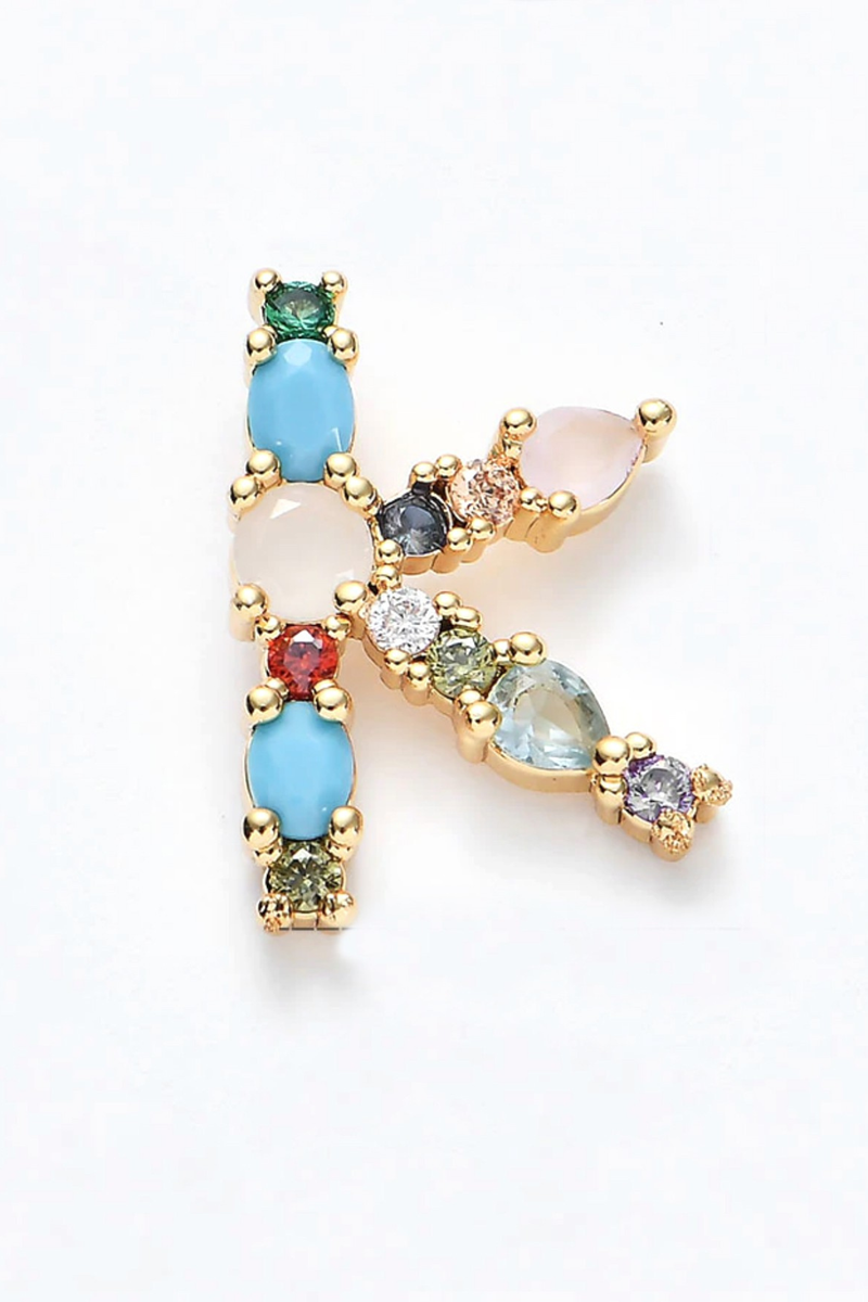 Jewelry with multicolored gemstones on a white background