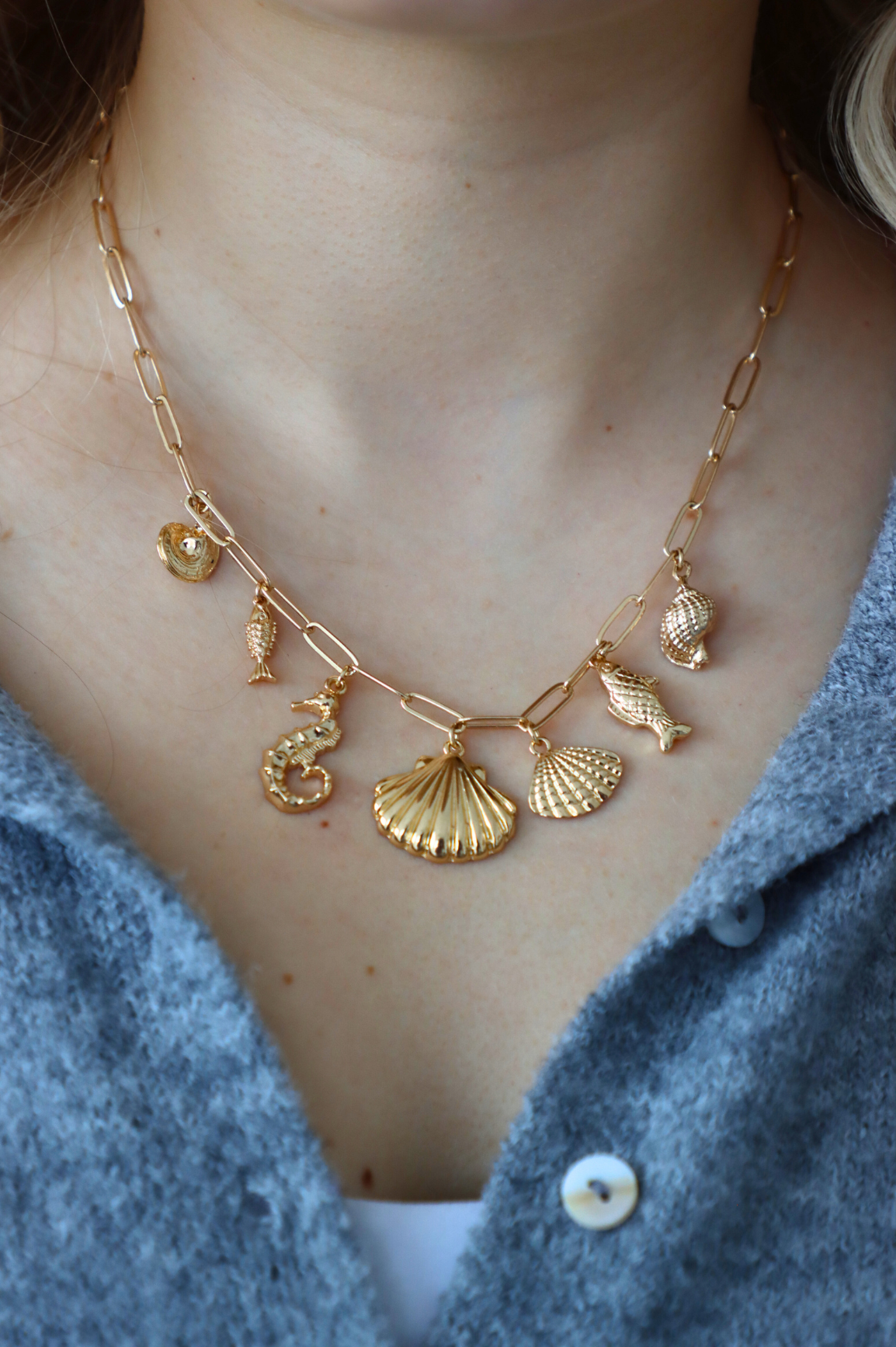 gold seashell charm necklace