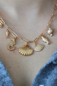 gold seashell charm necklace