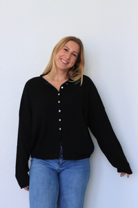 girl wearing black cardigan