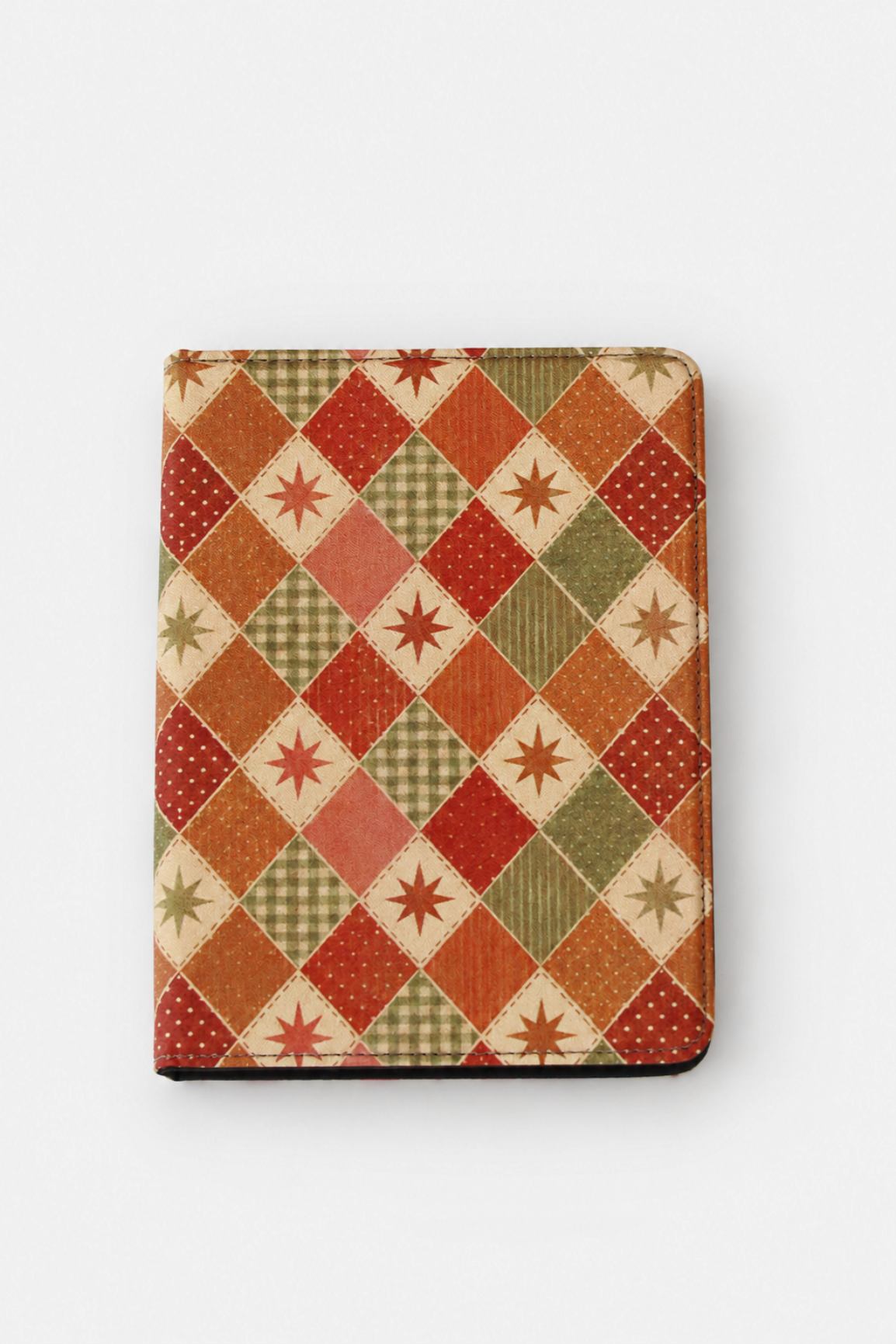 A rectangular tablet case featuring a vintage-style patchwork argyle pattern with red, orange, green, and beige diamond sections, set against a plain light gray background.