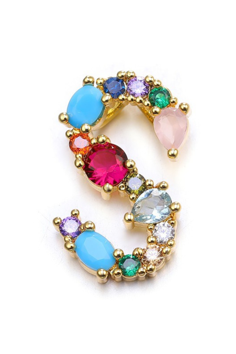Multicolored gemstone earring with gold setting on a white background