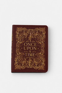 A dark red faux-leather kindle case cover featuring gold foil embossed text reading 'ONCE UPON A TIME' surrounded by an ornate floral border, shown on a white background.
