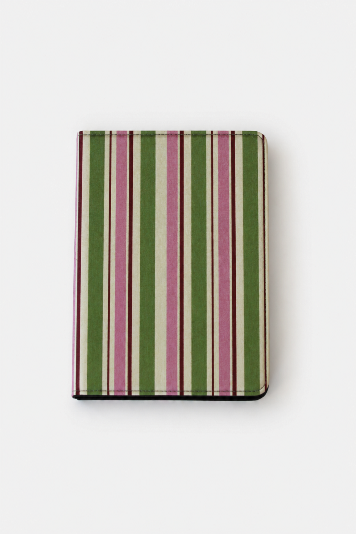 A slim hardcover notebook or journal with a vertical striped pattern in olive green, dusty pink, and cream, shown closed on a clean white background.