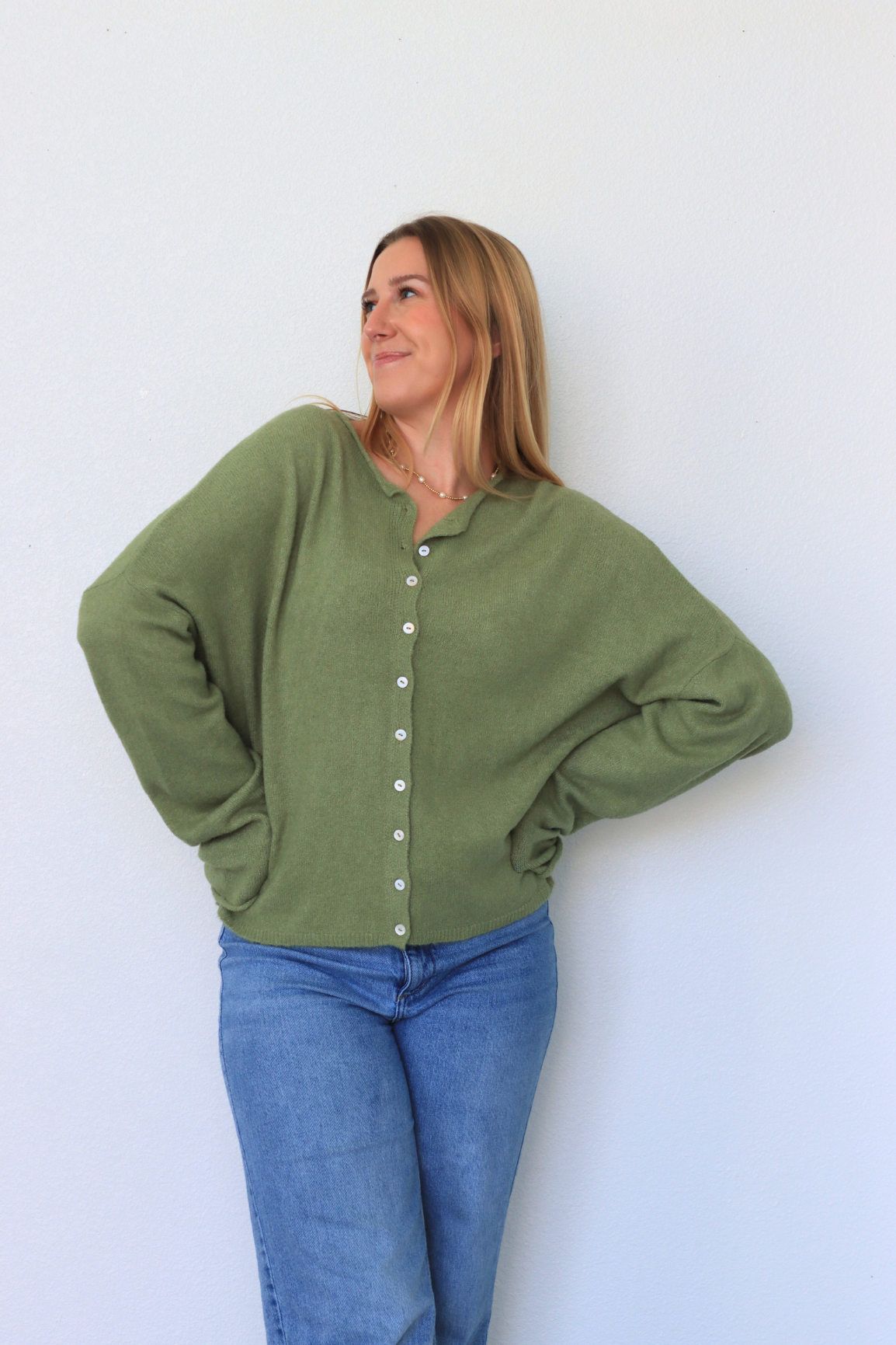 girl wearing green cardigan 