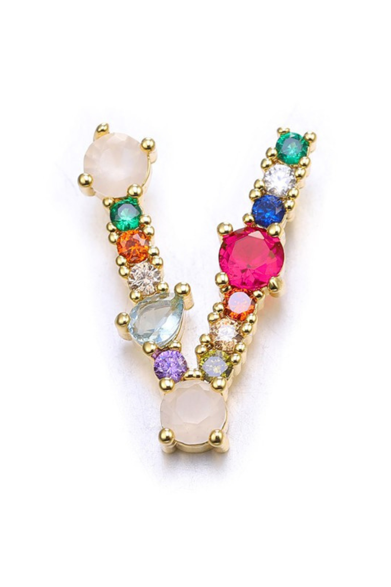 Colorful gemstone earrings on a white background