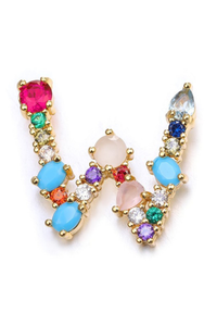 Colorful gemstone earrings on a white background