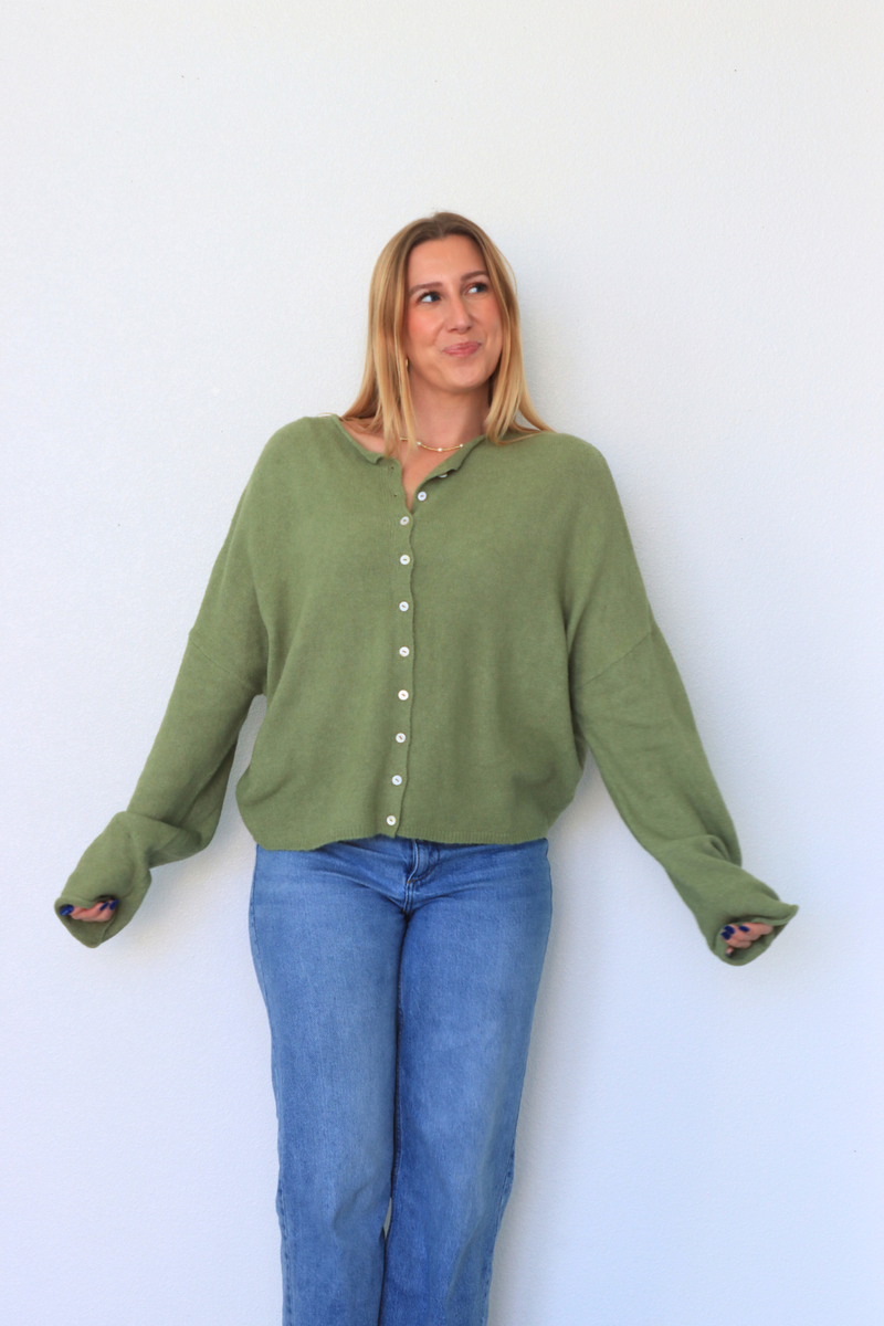 girl wearing green cardigan 
