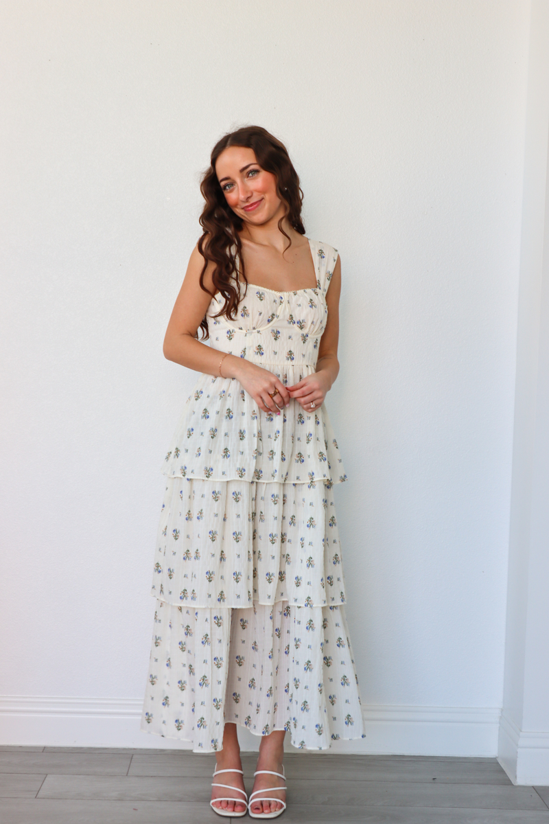 girl wearing white floral long dress