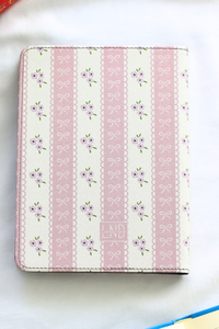 Patterned kindle cover with floral design on a white background