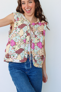 girl wearing multicolor quilted vest