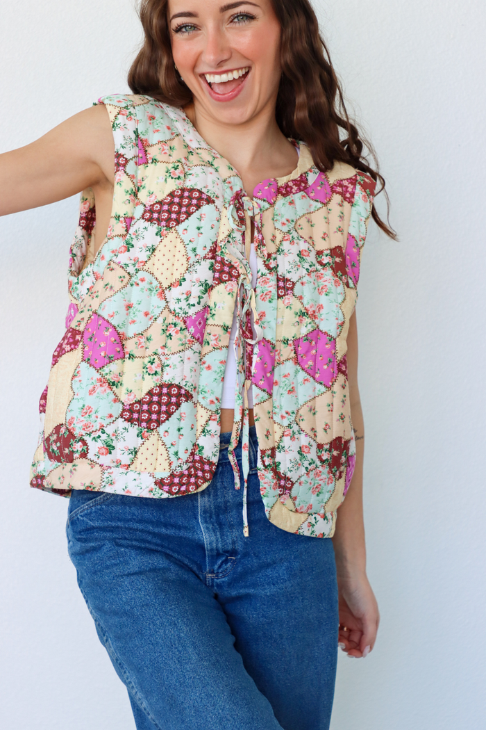 girl wearing multicolor quilted vest