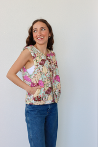 girl wearing multicolor quilted vest