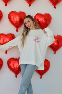 girl wearing white long sleeve "i like you cherry much" graphic tee