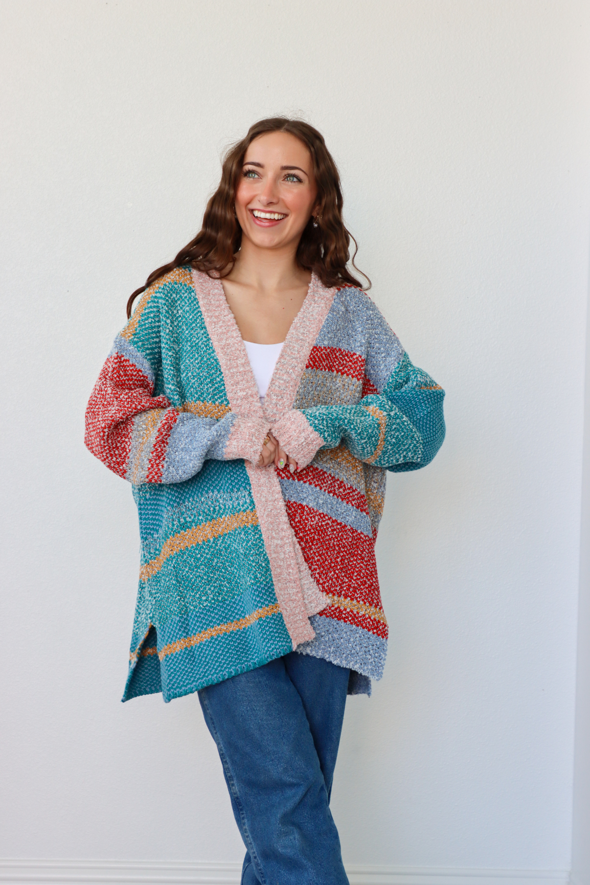 girl wearing multicolor striped cardigan