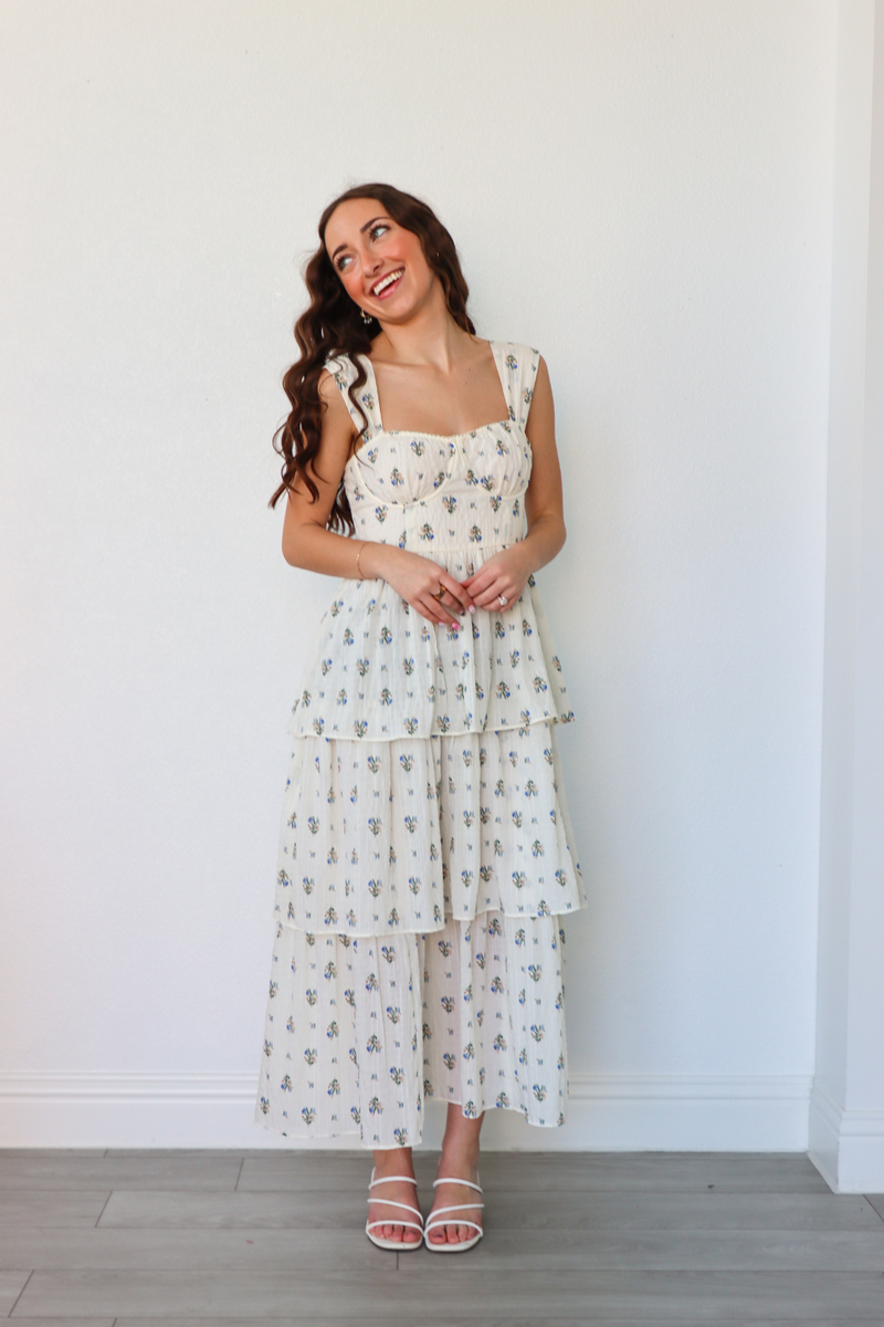 girl wearing white floral long dress