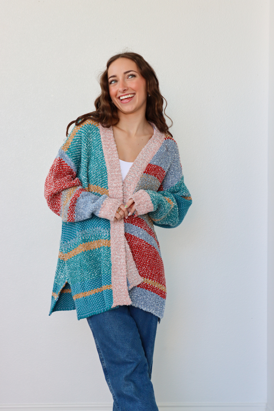 girl wearing multicolor striped cardigan