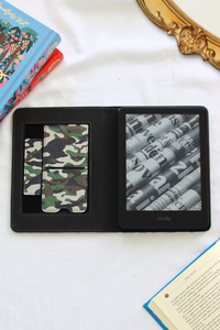 Black leather kindle case with camouflage pattern and on a white surface