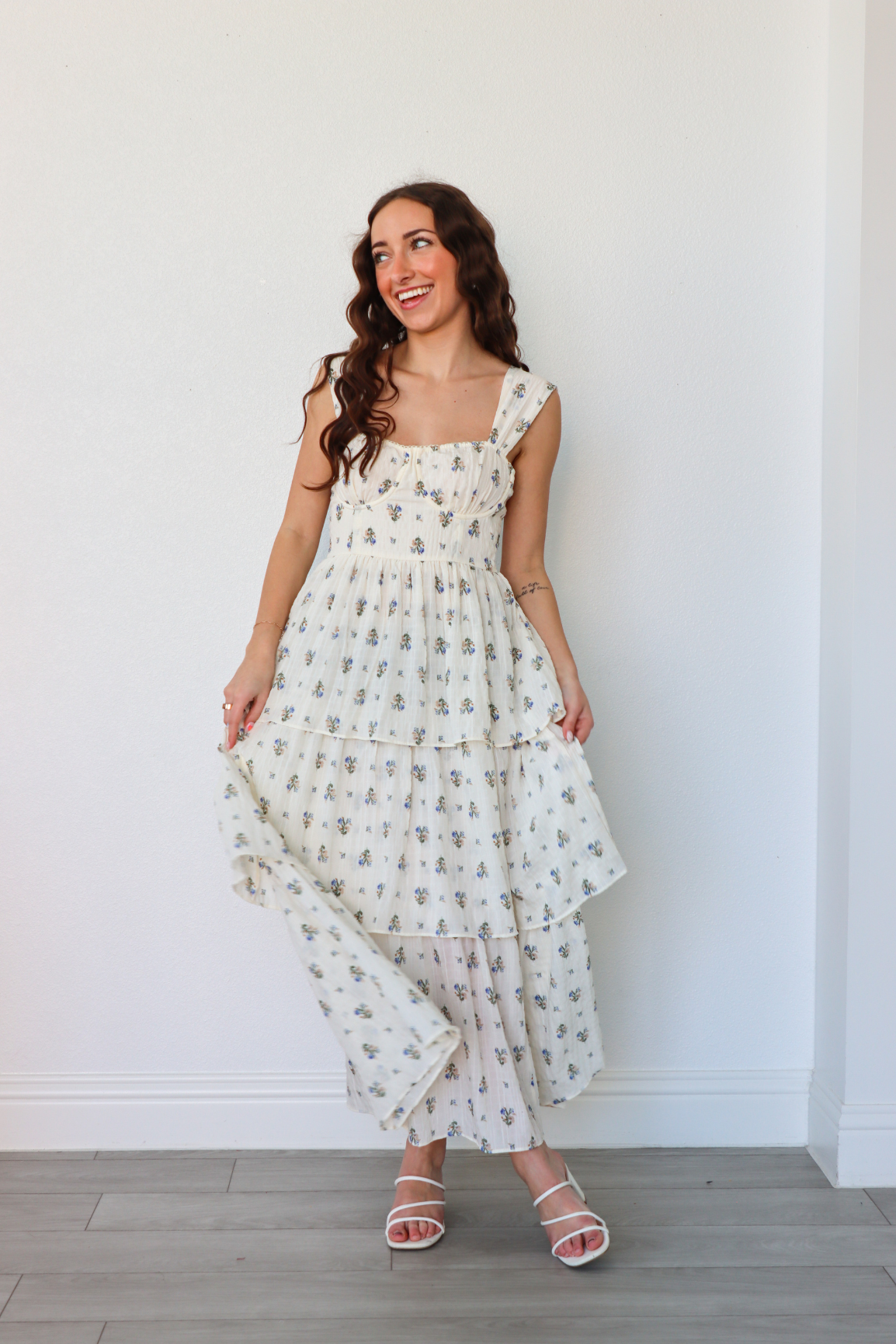 girl wearing white floral long dress