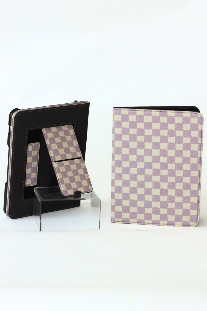 A nook case with a lavender and cream checkerboard pattern, shown in both closed and open/extended positions on a clear acrylic stand against a white background.