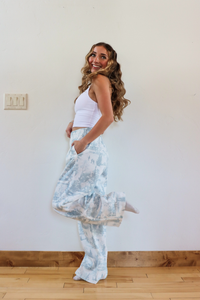 girl wearing toile holiday pajama pants