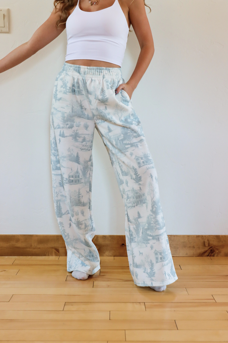 girl wearing toile holiday pajama pants