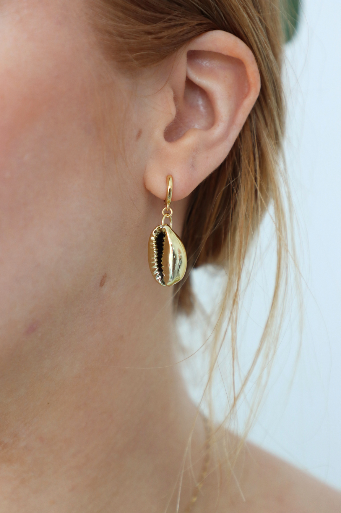 seashell gold huggie earring