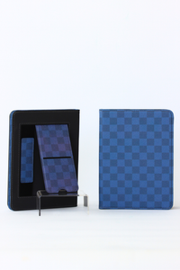 Blue checkered tablet case with stand on a white background