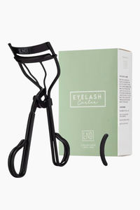 A black eyelash curler shown next to its mint green and white packaging box on a clean white background.