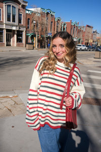 Woman wearing a striped sweater
