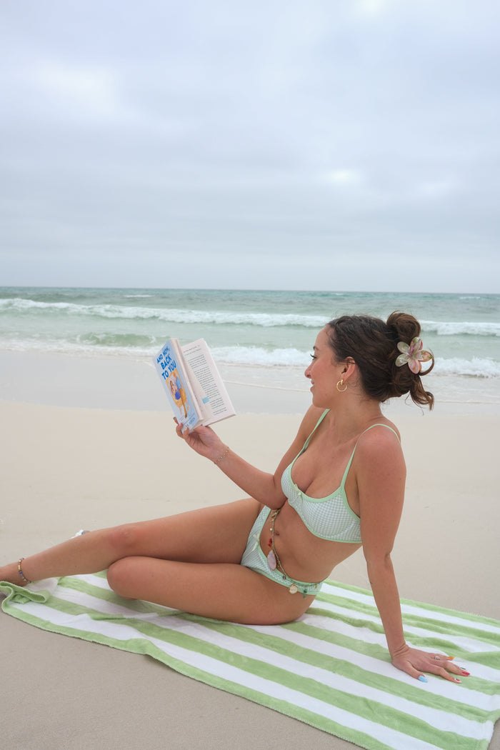girl wearing mint green gingham bikini