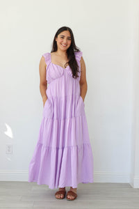 girl wearing purple maxi dress