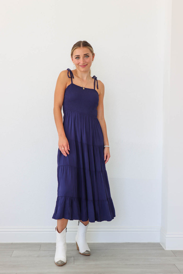 girl wearing navy blue midi dress