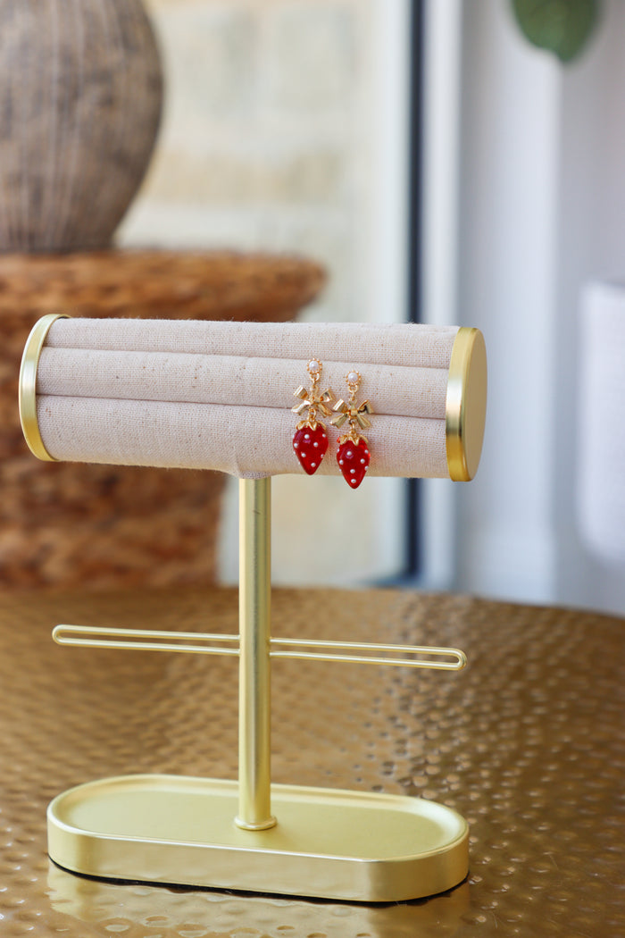 gold and red bow and strawberry earrings