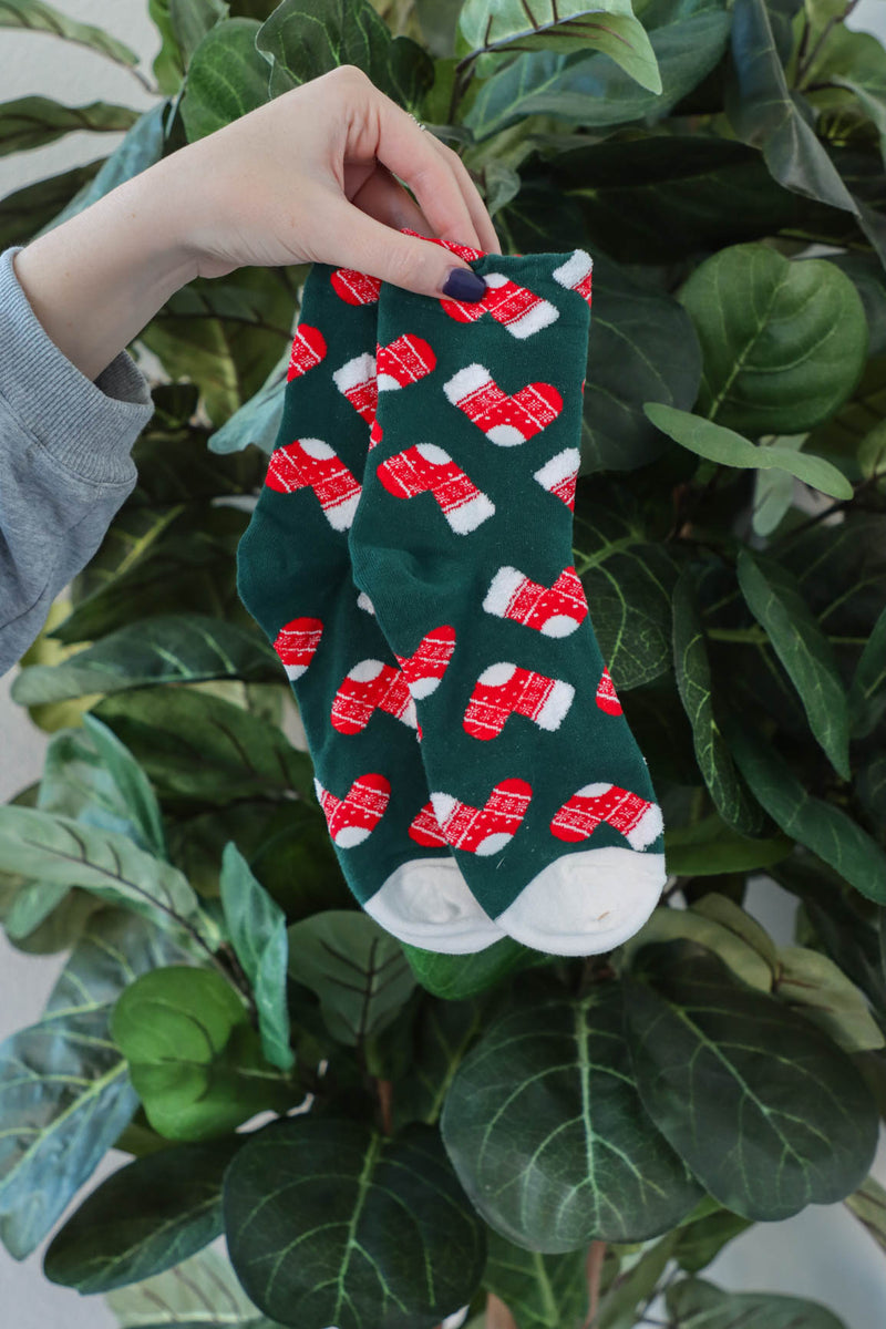 green christmas socks with stocking pattern