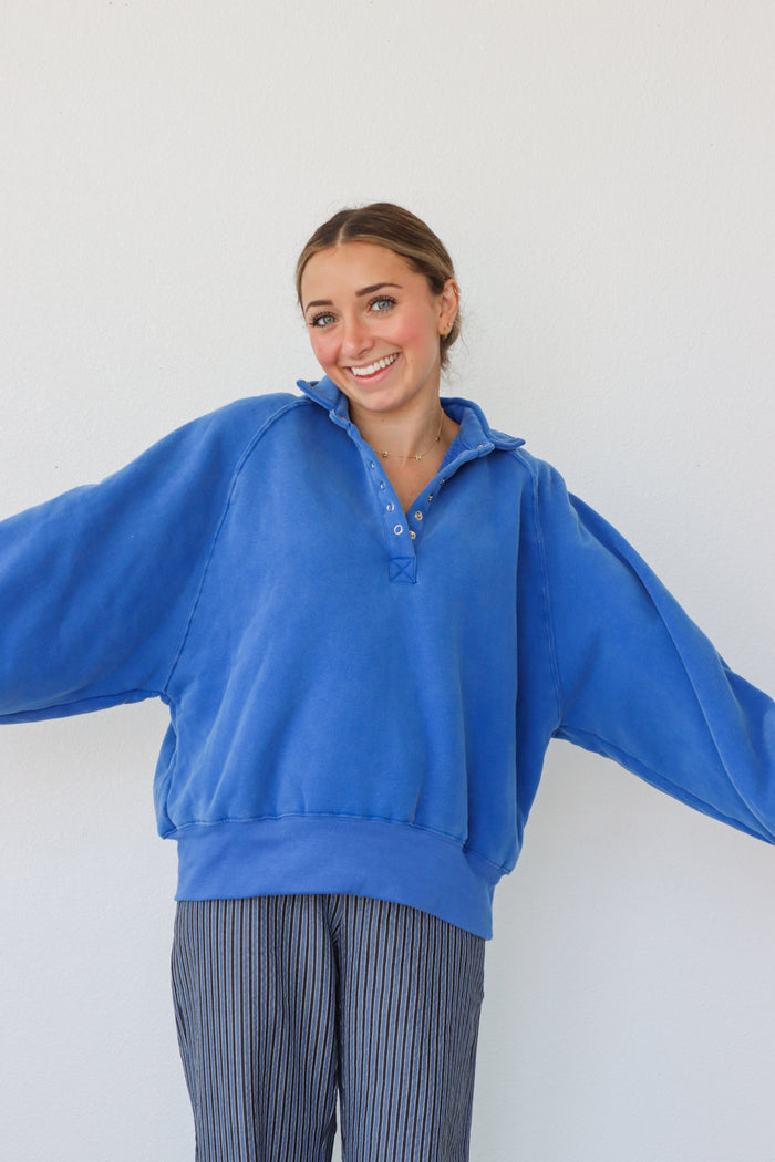 girl wearing royal blue fleece pullover