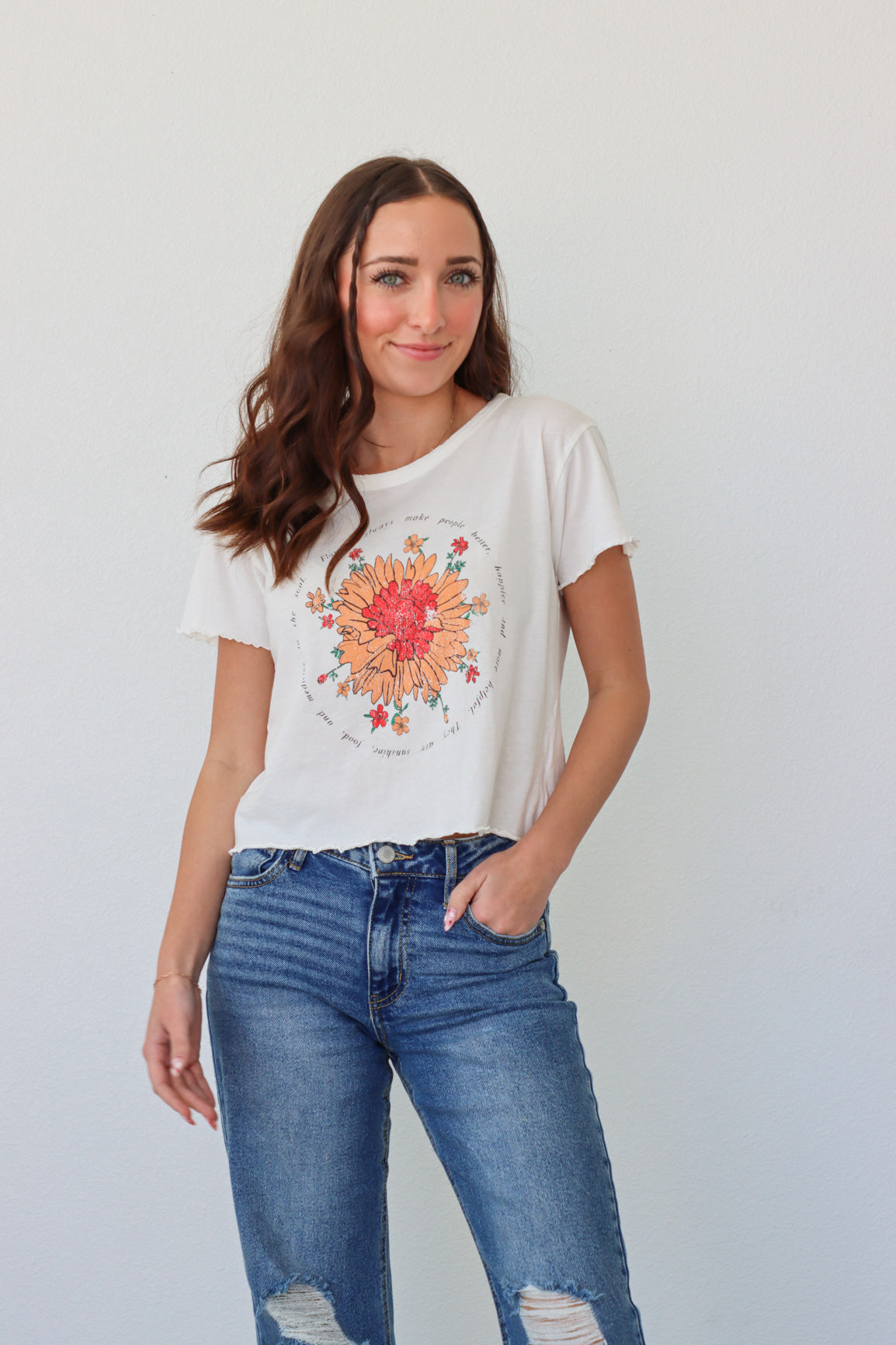 girl wearing white t-shirt with floral graphic