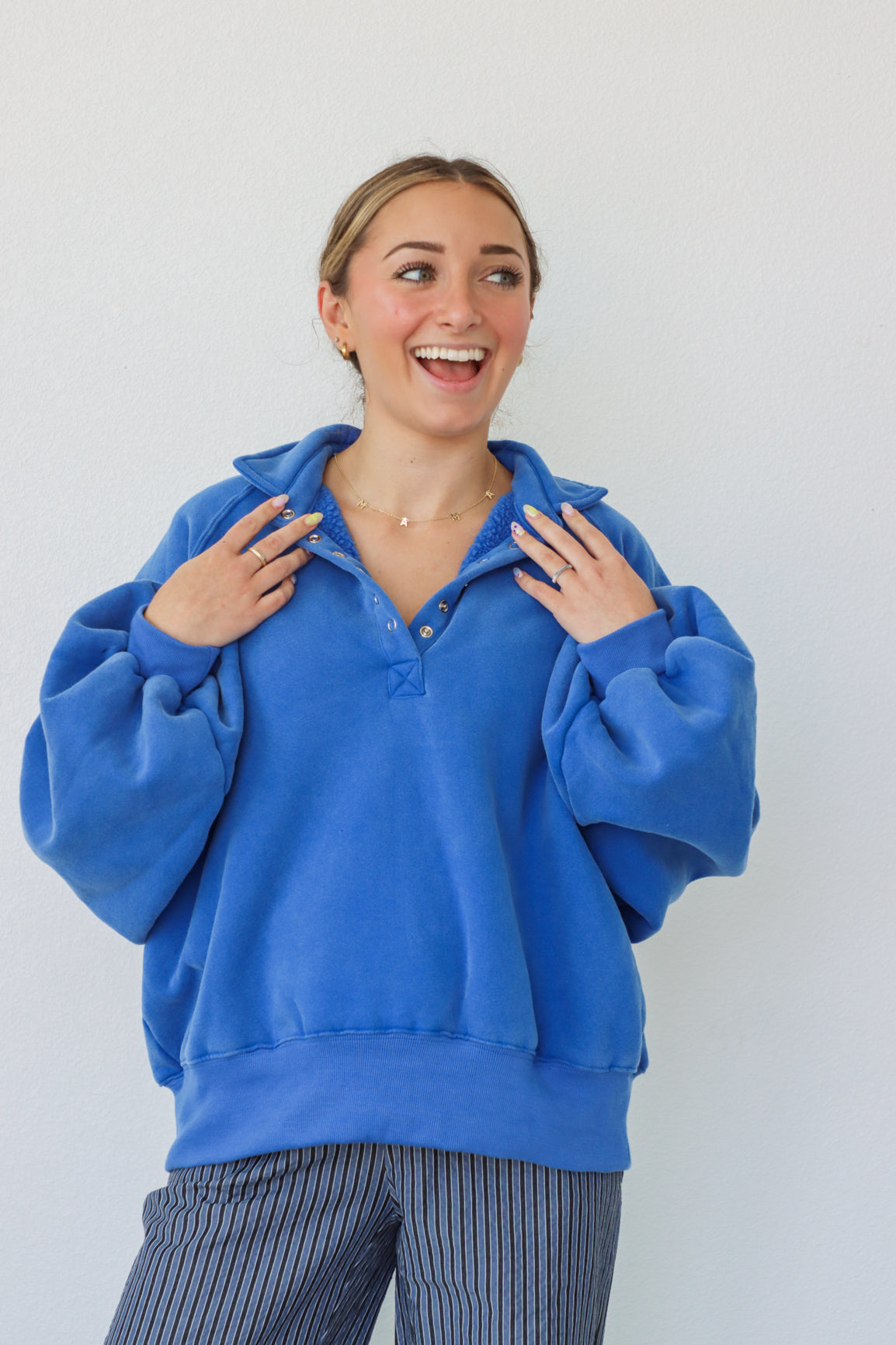 girl wearing royal blue fleece pullover