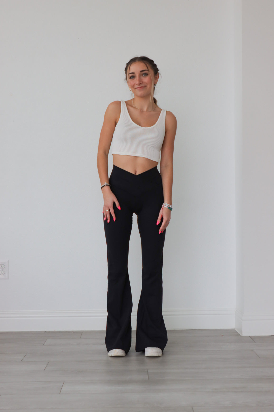 girl wearing black flare yoga pants