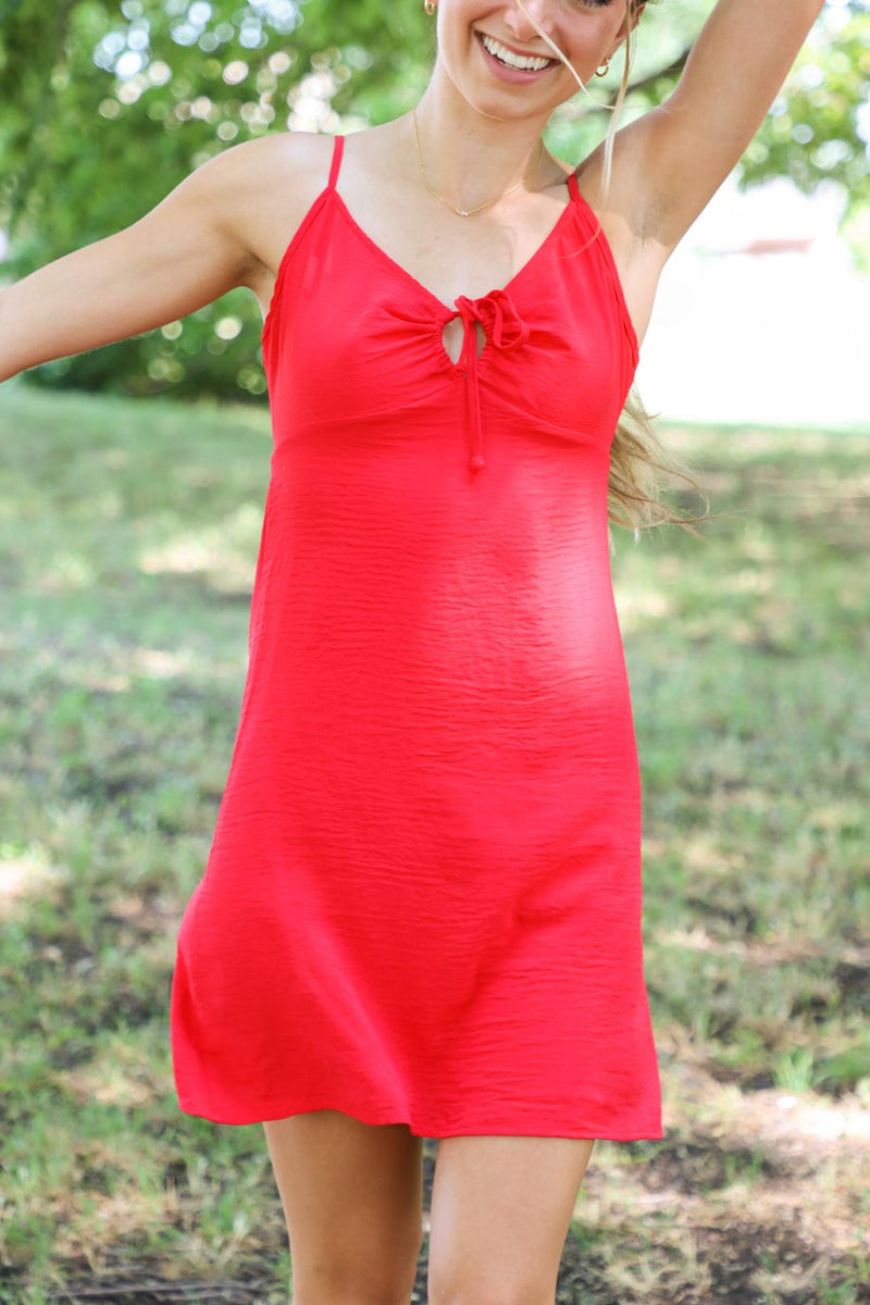 girl wearing short red tank top dress with keyhole detailing