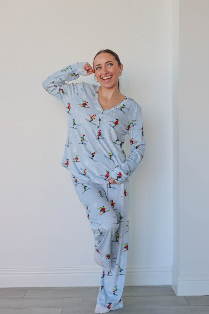 girl wearing light blue ski pajamas