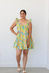girl wearing multicolored short dress