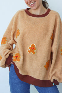 girl wearing tan gingerbread sherpa crewneck