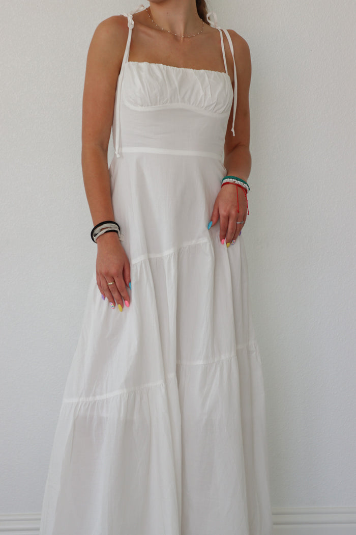 girl wearing white long dress