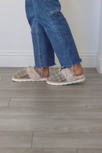 girl wearing gray plaid slippers