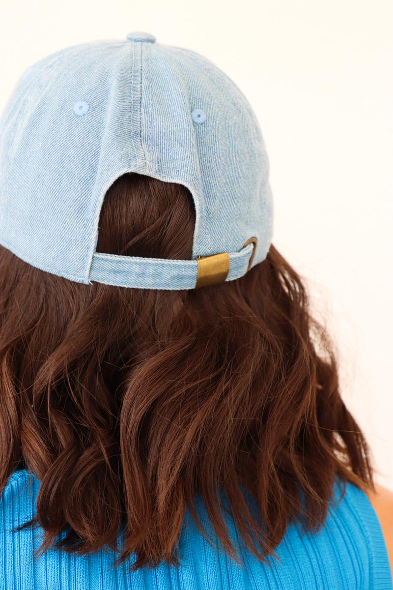 adjustable sizing on light blue chambray hat with "usa" embroidery